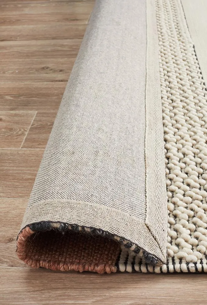 Chaaya Hand loomed Wool Rug  White Peach