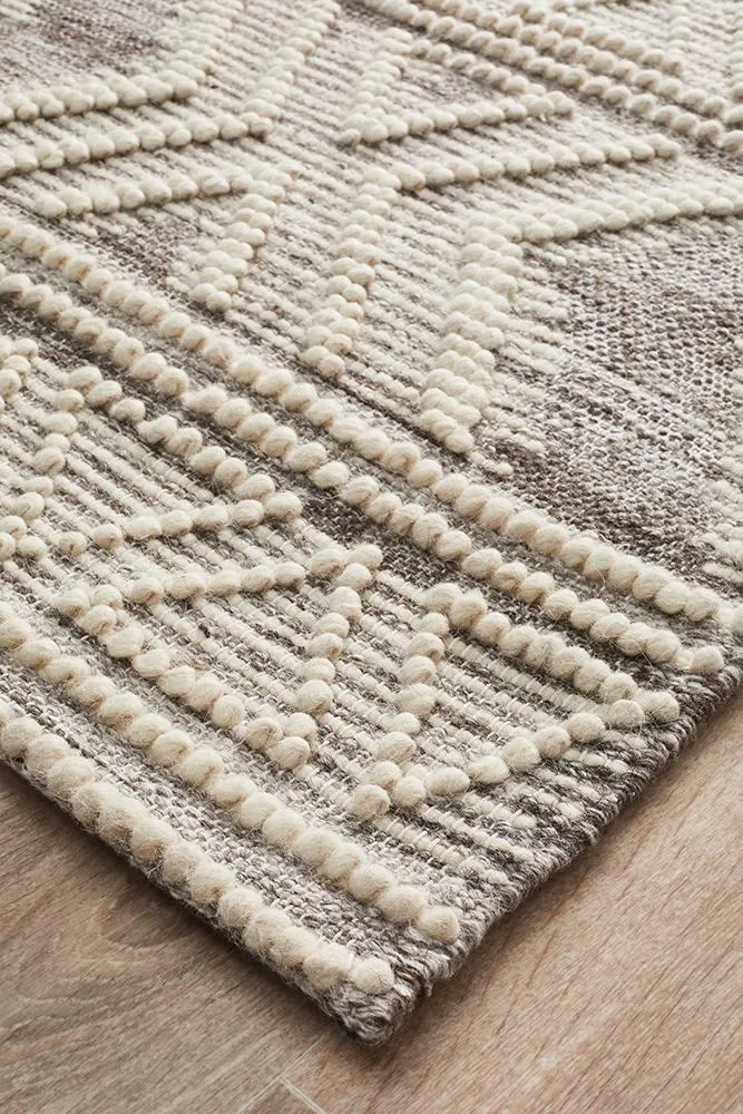 Charita Hand loomed Wool Rug  Natural