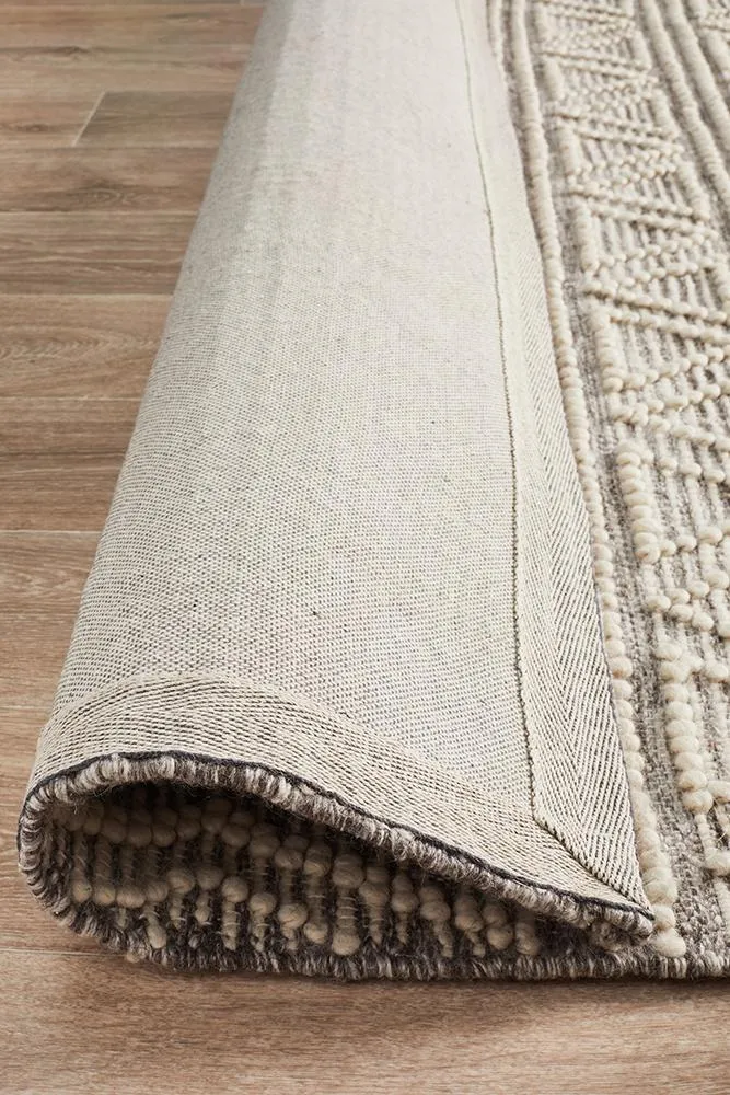 Charita Hand loomed Wool Rug  Natural